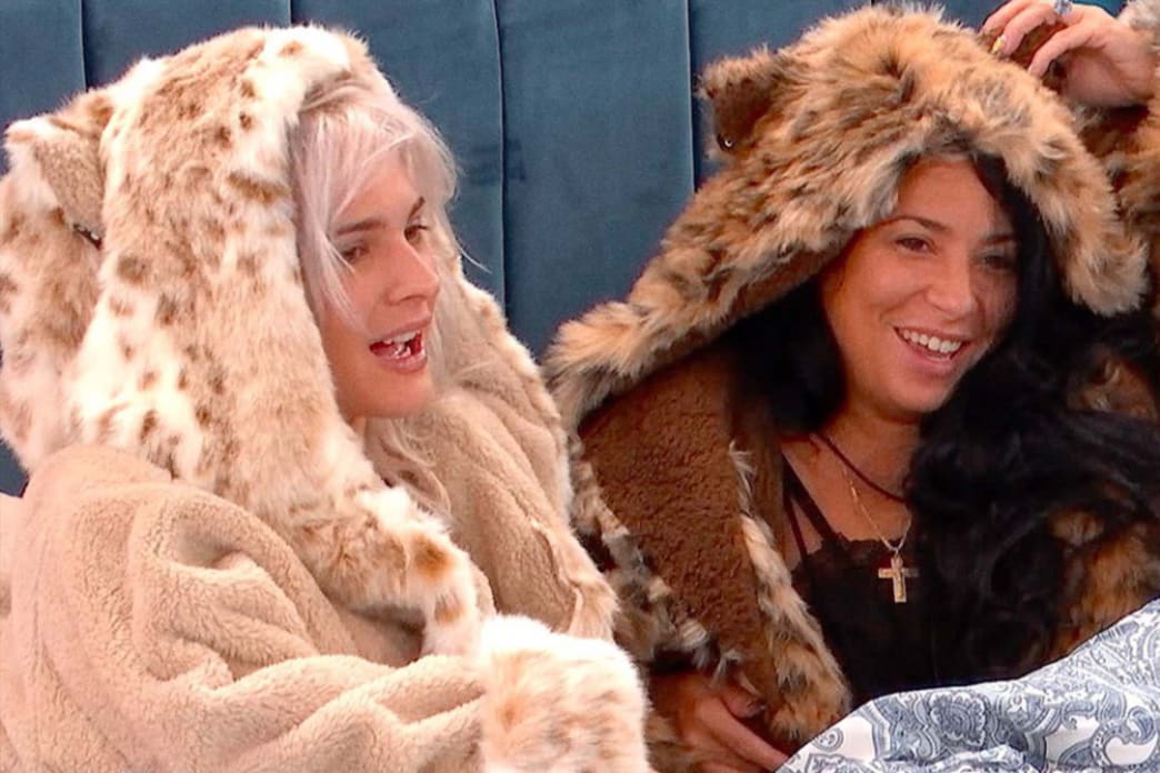 women wearing faux fur robes