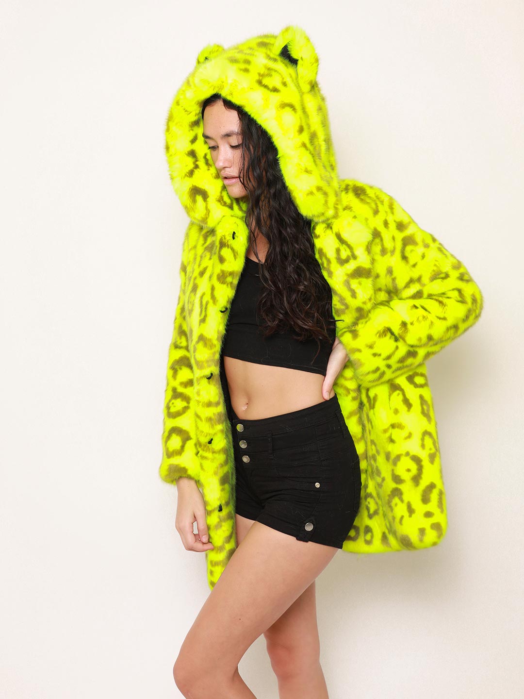 Woman wearing Neon Yellow Leopard Luxe Classic Faux Fur Coat, side view 2