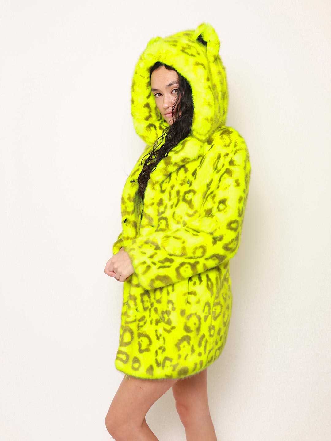 Woman wearing Neon Yellow Leopard Luxe Classic Faux Fur Coat, side view 1