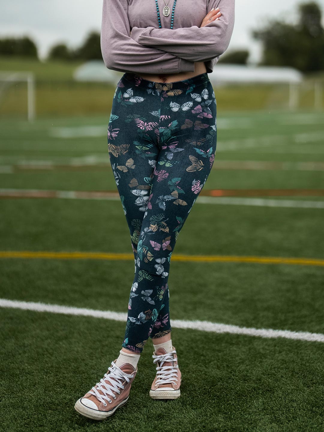 Woman wearing Butterfly Velvet SpiritHoods Leggings, front view 1