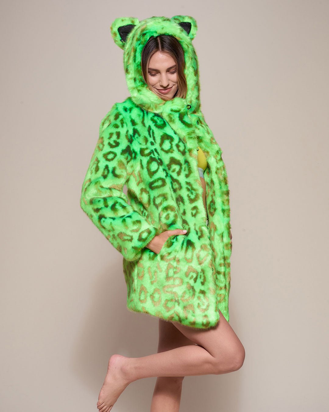 Woman wearing Neon Green Leopard Luxe Classic Faux Fur Coat, side view 1