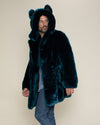 Handsome man looking back in thought while strolling in his Royal Wolf Classic faux fur jacket.