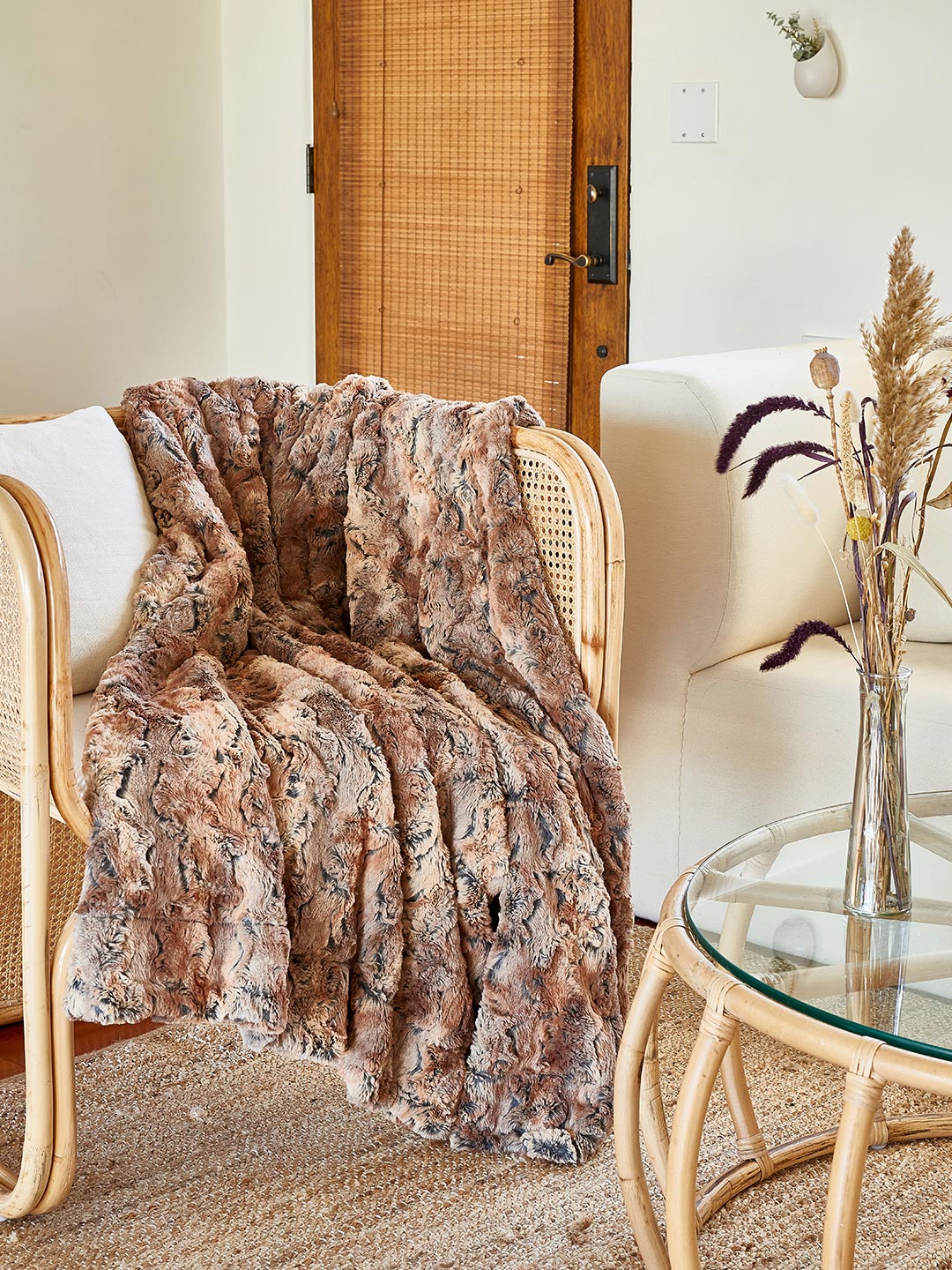 Red Wolf Luxe Fake Fur Throw on Chair in Living Room