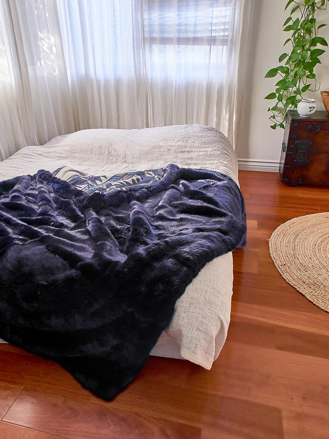 Indigo Fox Faux Fur Throw on Bed