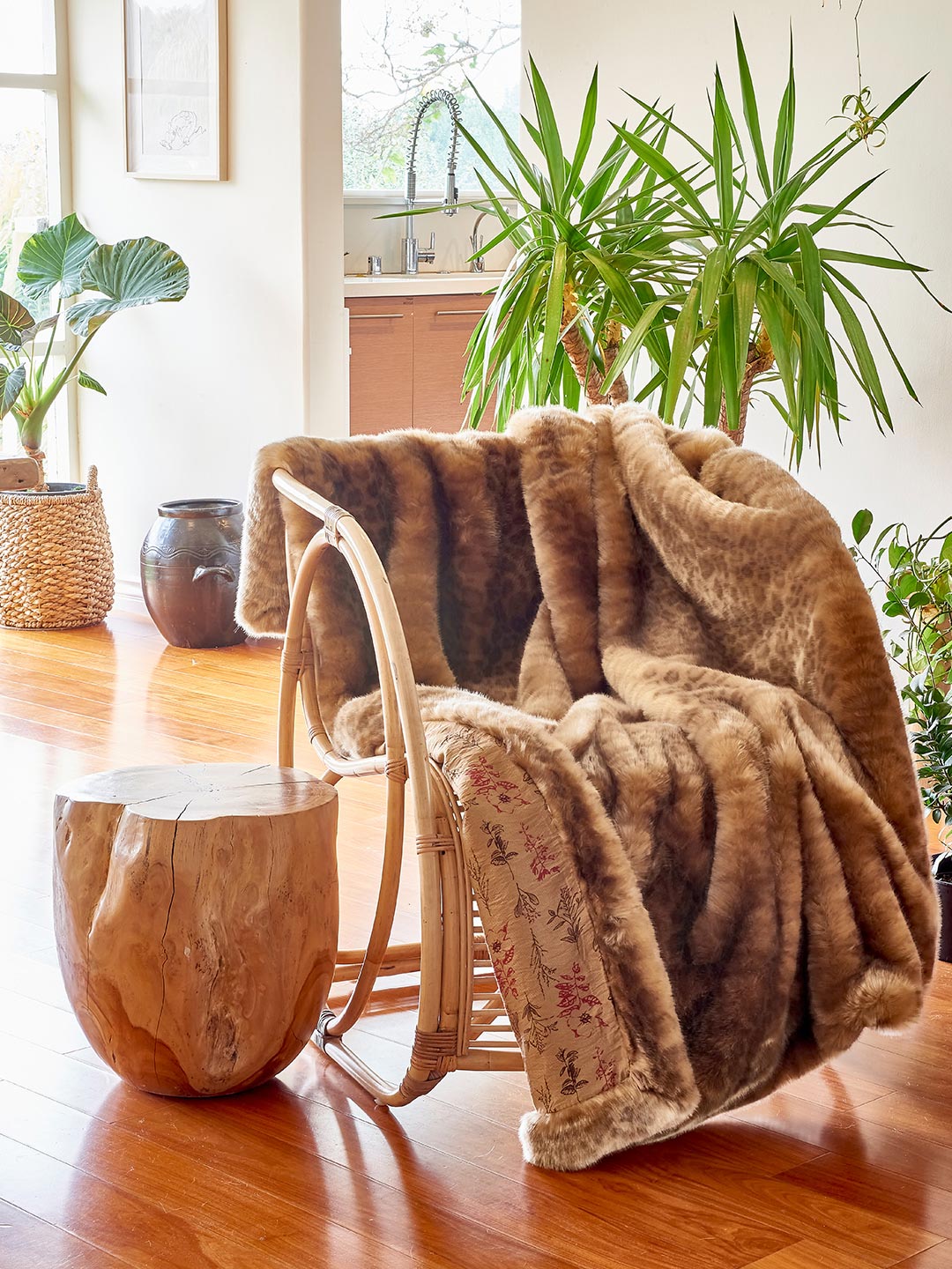 African Golden Cat Luxe Faux Fur Throw on Living Room Chair