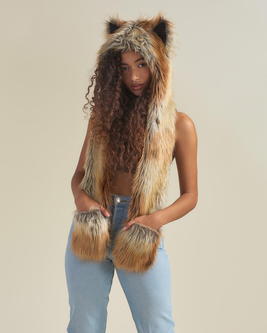 Woman Wearing Red Fox Faux Fur Hood with Hands in Pawkets