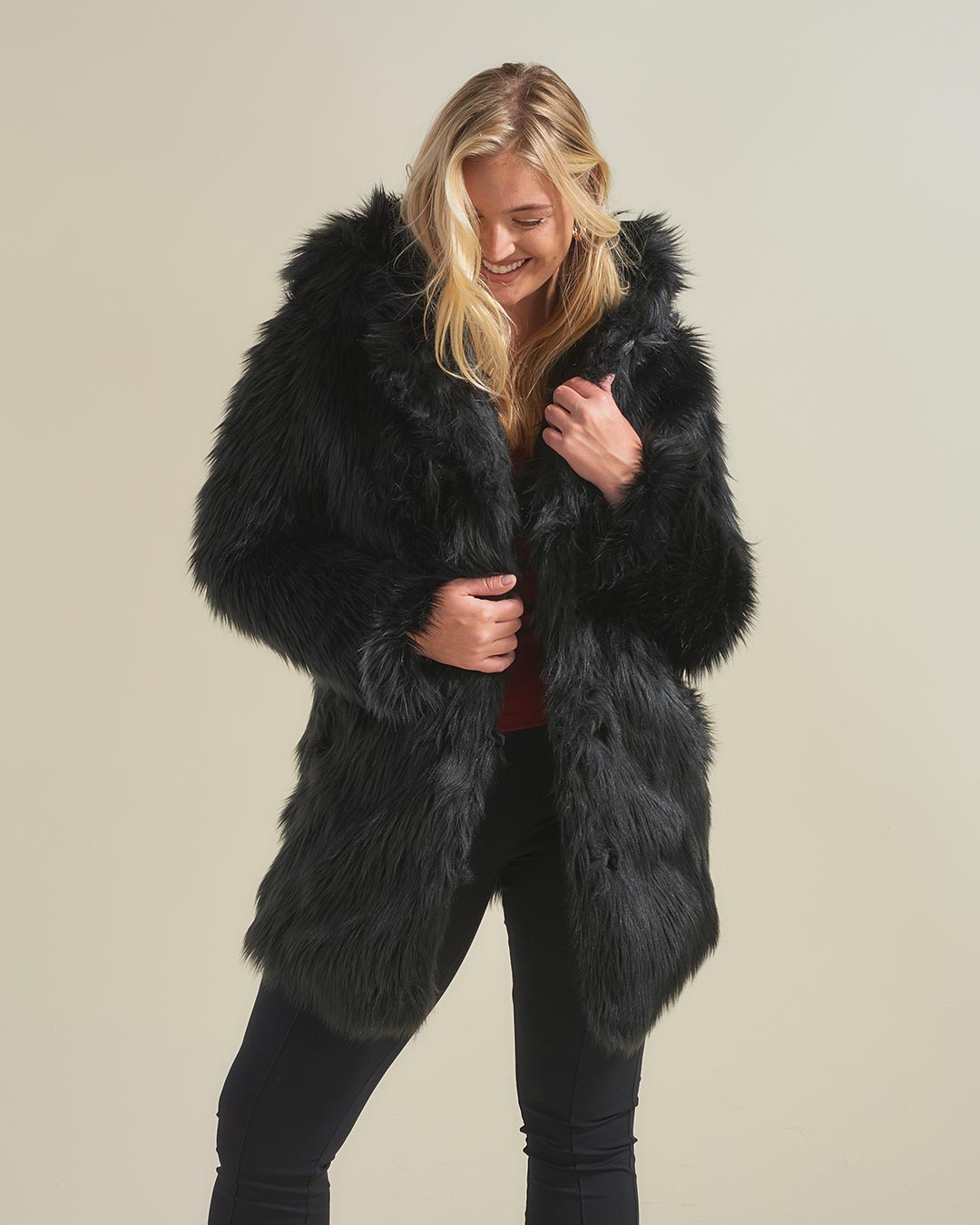 Woman Wearing Black Wolf Hooded Faux Fur Coat