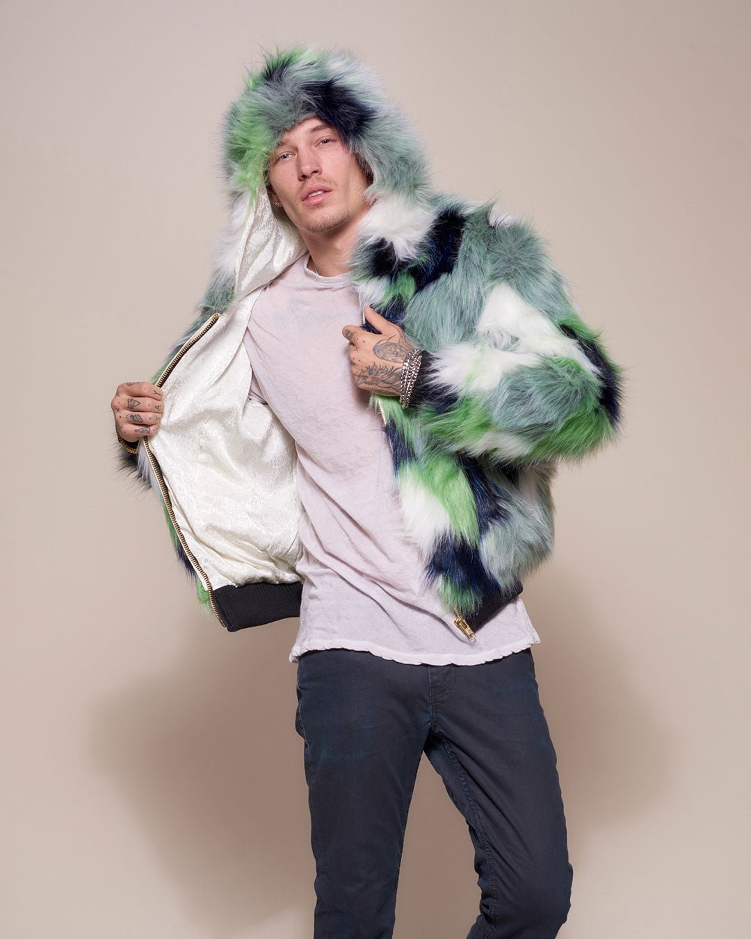 Man wearing Emerald Hummingbird Hooded Faux Fur Bomber Jacket, front view 3