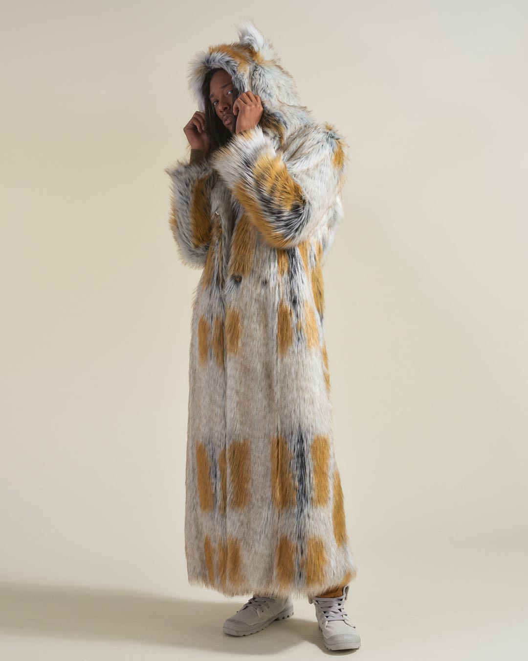 Man wearing Arctic Fox Classic Faux Fur Long Coat, side view 1