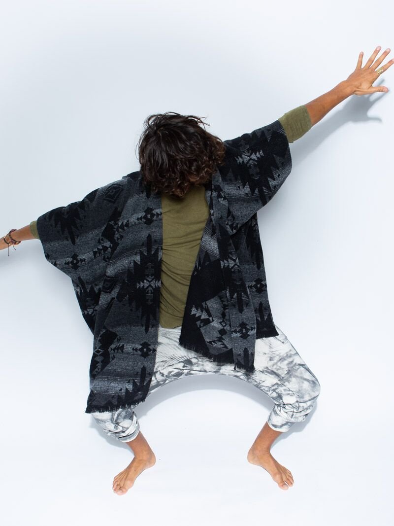 Man wearing Night Fox Fabric Poncho, front view 3