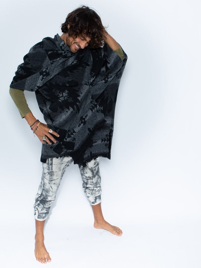 Man wearing Night Fox Fabric Poncho, side view 3