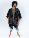 Man wearing Night Fox Fabric Poncho, front view 2