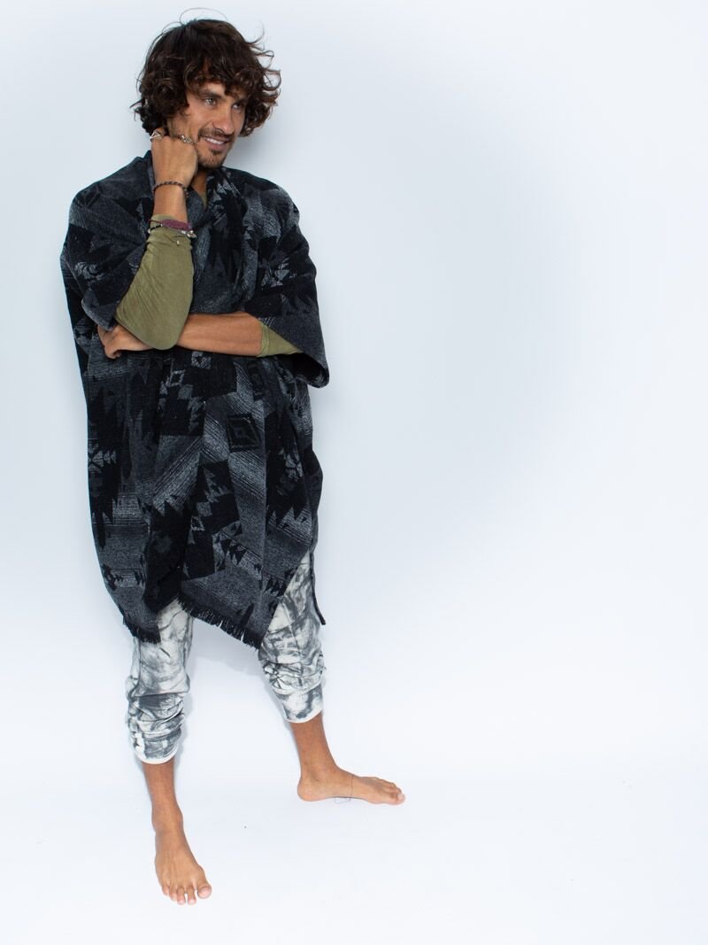 Man wearing Night Fox Fabric Poncho, side view 1