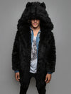 Dude in realistic Wolf Coat in Black, facing camera while wearing hood and ears, with his arms to his sides.