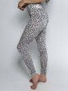 Woman wearing Spotted Blue Leopard Velvet Leggings, side view 3