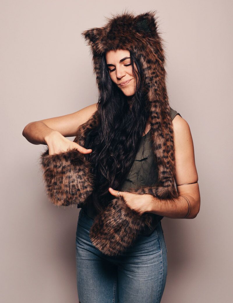 Woman wearing faux fur Collector Edition Savannah Cat SpiritHood, front view 1