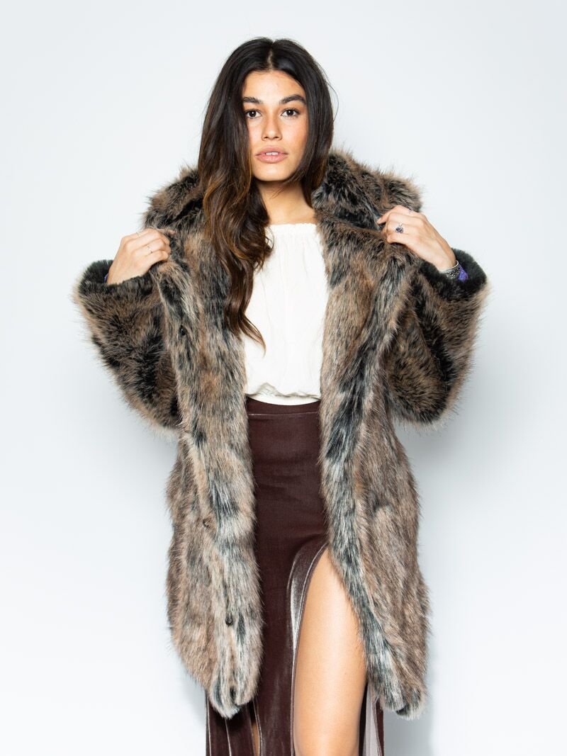 Woman wearing faux fur Direwolf Galaxy Collector Edition Coat, front view 1