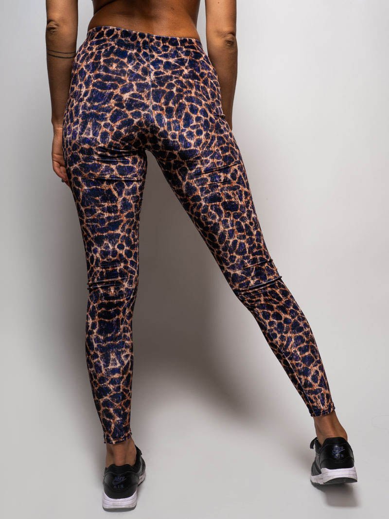 Back View of Purple Cheetah Velvet Leggings on Woman