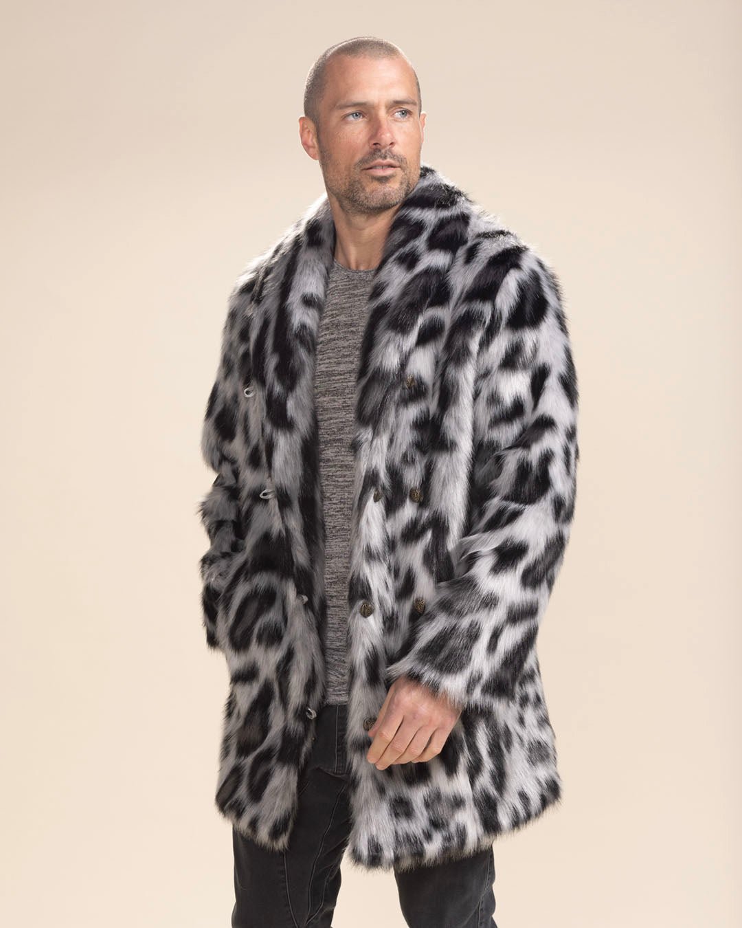 Handsome man gazing into the distance, simulating a stroll with one hand in pocket of Himalayan Snow Leopard Collared Fake Fur Jacket.