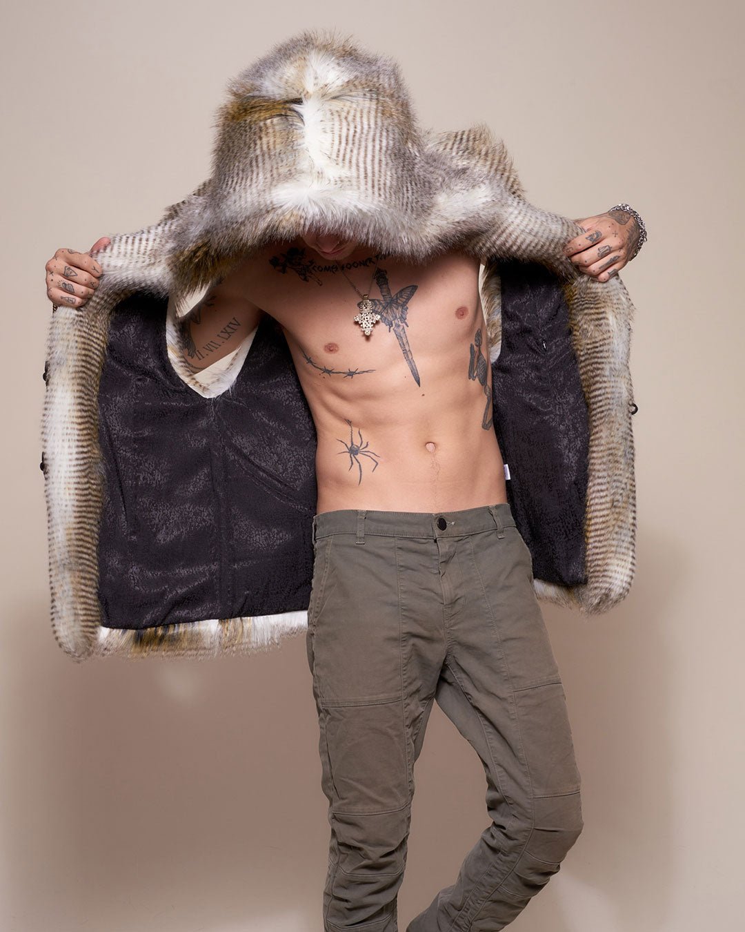 Man wearing Alaskan Hawk Hooded Faux Fur Vest,  front view