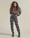 Woman wearing Grazer Wolf Artist Edition Faux Fur Animal Onesie, front view 4