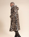 Handsome, shaved-head man facing sideways, showing side of Classic Men's Long Realistic Fur Coat in Arabian Leopard Print, hood down.