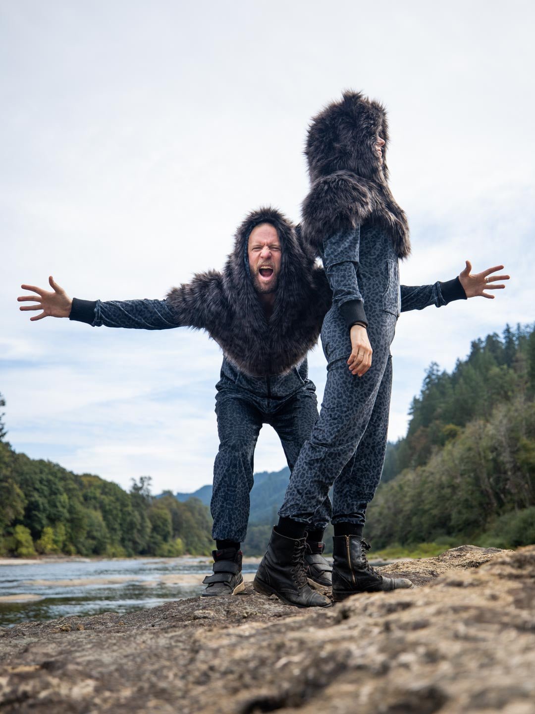 Growling Man and Side View of Woman Wearing Black Panther Velvet Classic Faux Fur Animal Onesie,