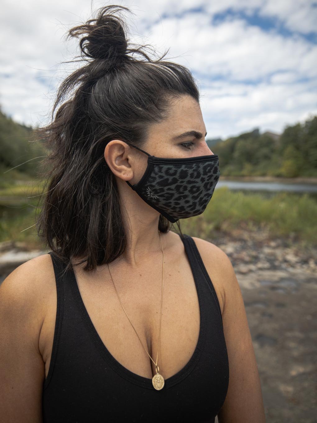 Woman Wearing Black Panther Copper-Threaded Face Mask