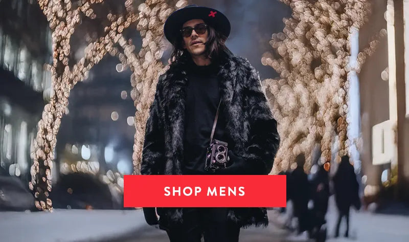 Man walking down a street wearing a black faux fur panther coat