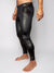 Man wearing Snakeskin Black Velvet Leggings, side view 1