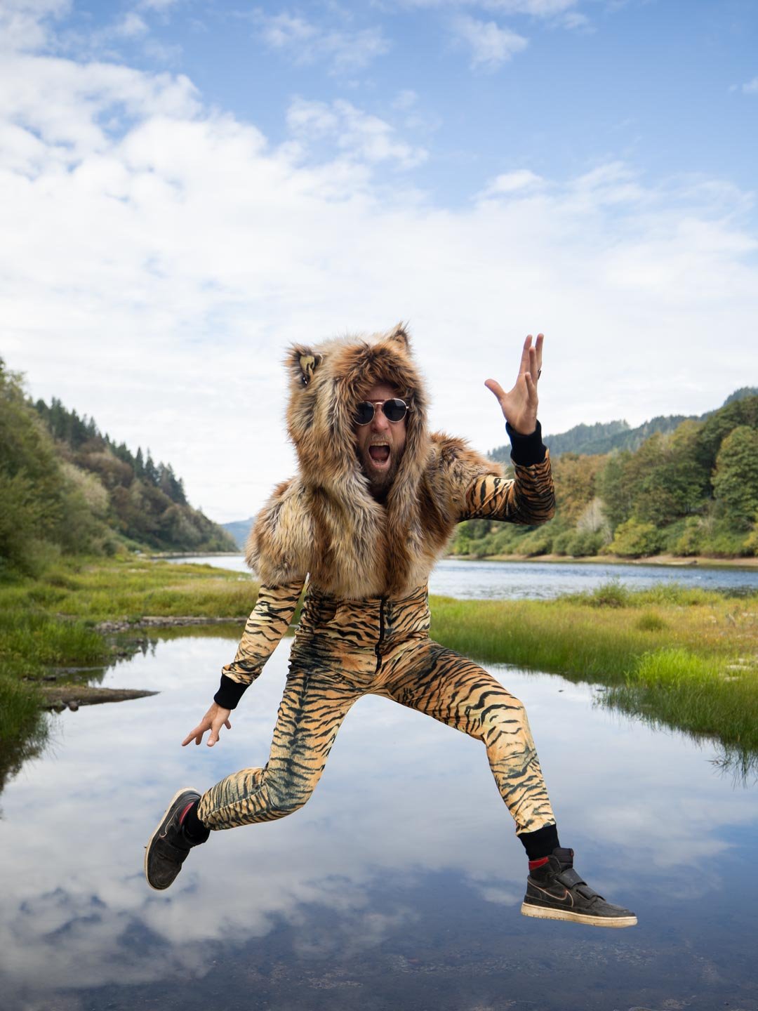 Man wearing Liger Velvet Classic Faux Fur Animal Onesie, front view 3