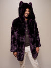 Dude wearing vegan Midnight Wolf Purple coat with hood and ears while smiling. 