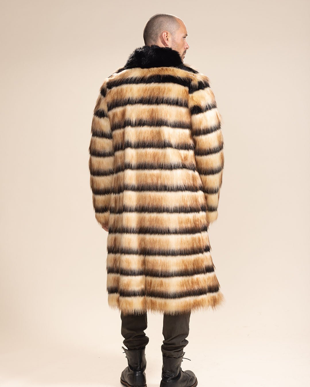 Nearly bald male model facing away from the camera, showcasing the Long Collared Gazelle Faux Fur Jacket.