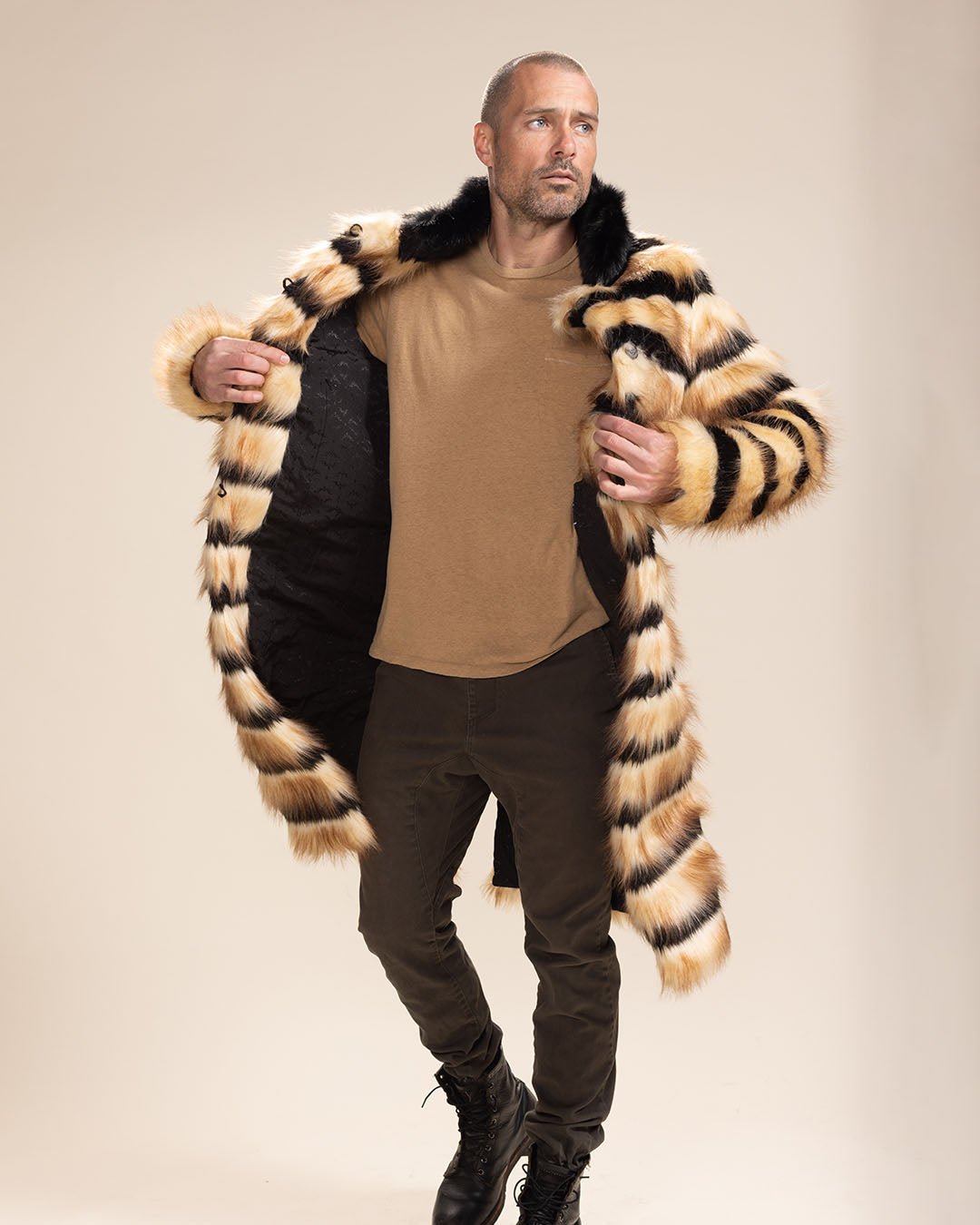 Hot guy in walking motion, looking away while holding open the Long Collared Gazelle Realistic Fur Coat.