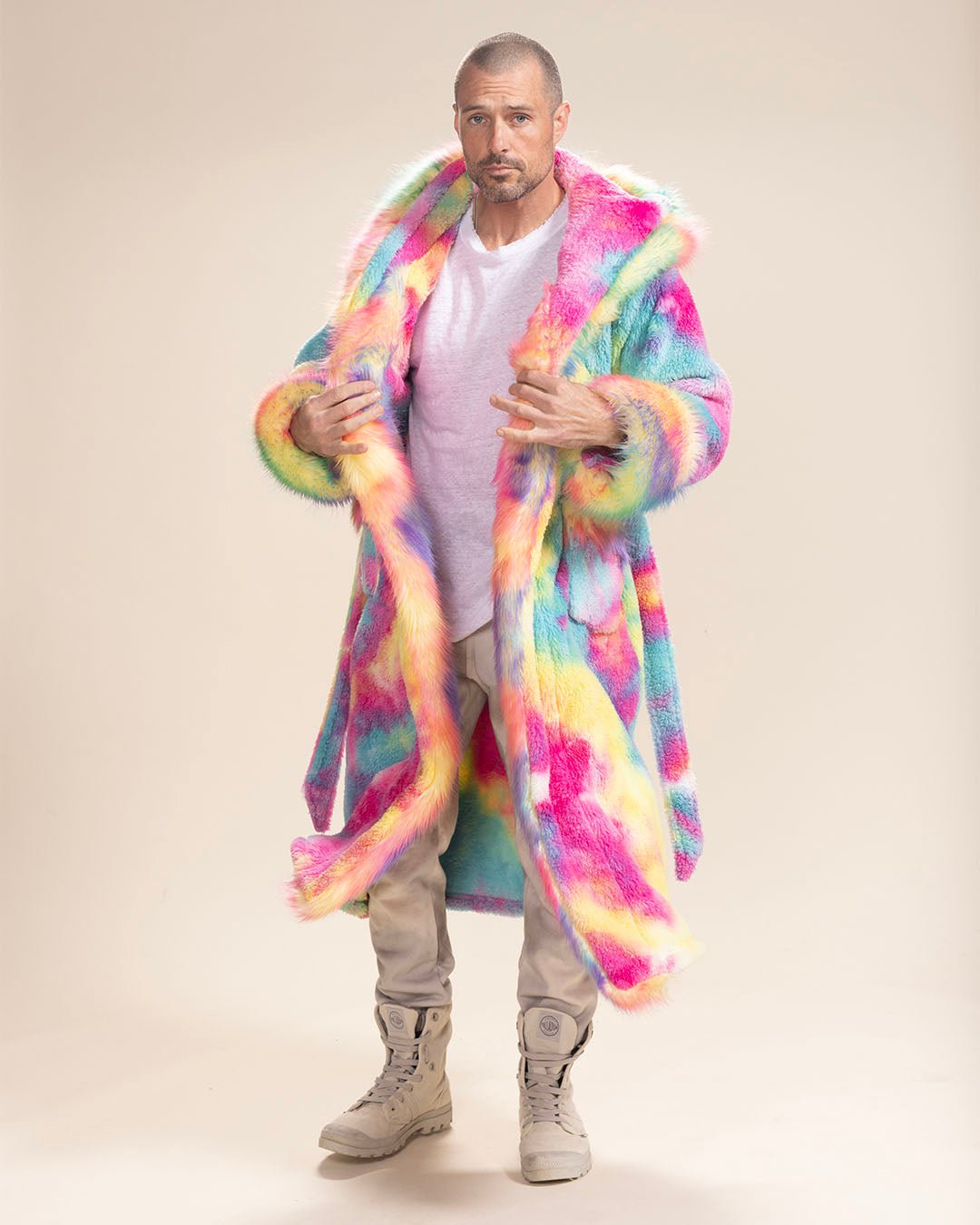 Handsome man in Rainbow Bear Faux Fur Robe, slightly open, hands on middle lapels, looking innocently at the camera.