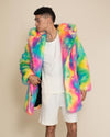 Young man in Rainbow Bear Vegan fur coat, hood down, facing forward while looking to the side—vibrant and eye-catching.