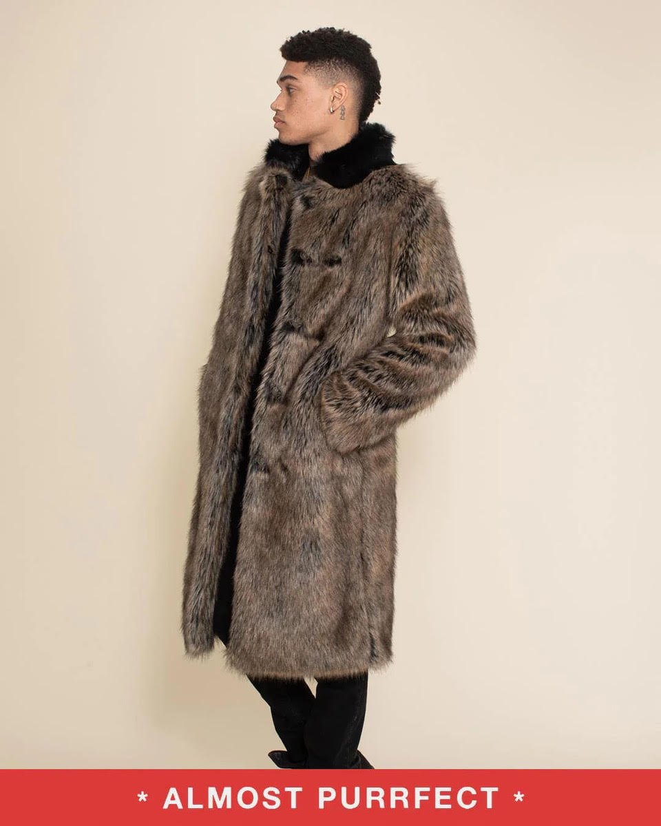 Handsome young man in Almost Purfect Dire Wolf Calf-Length Vegan Fur Coat, standing to one side with hand in pocket, showcasing its length.