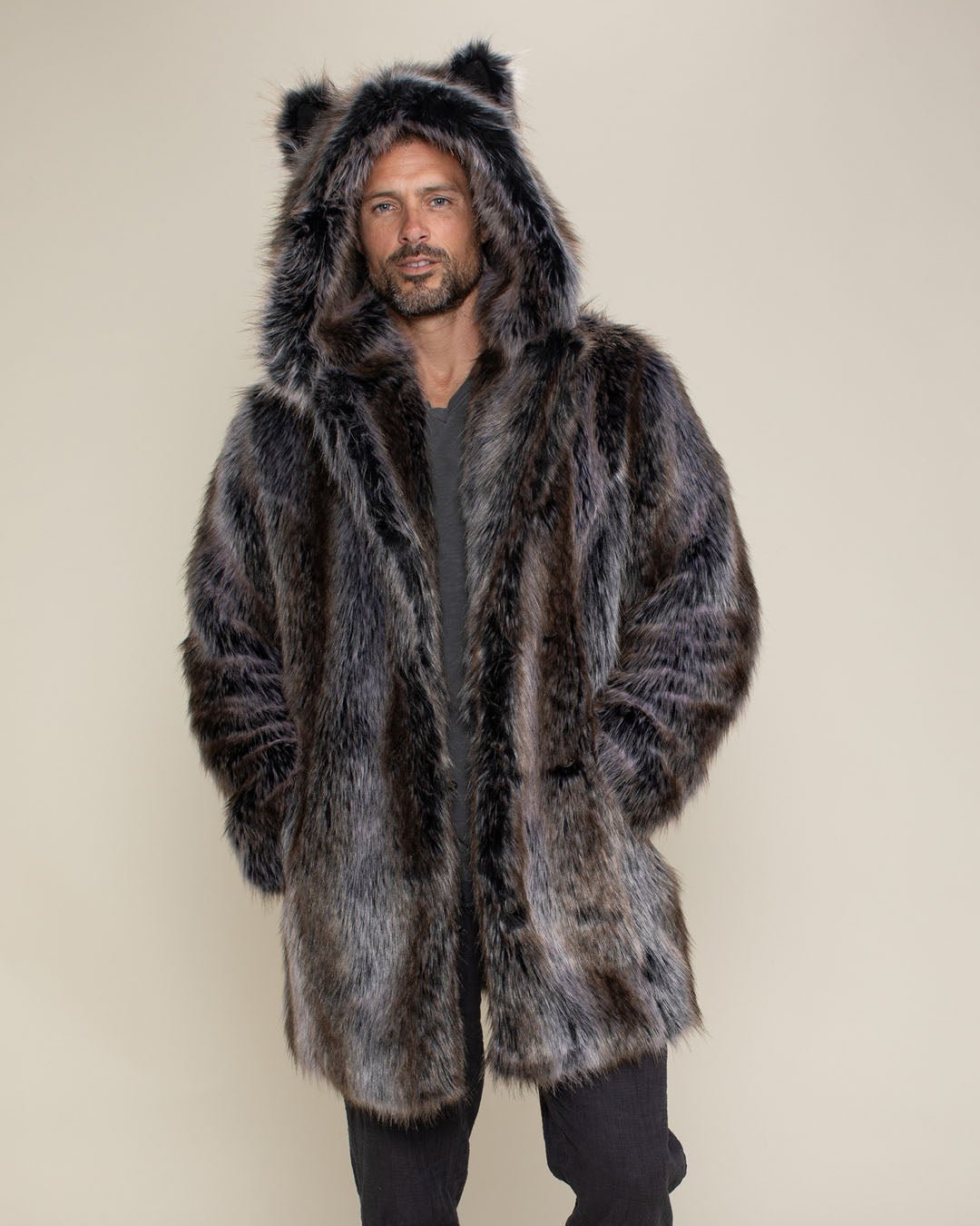 Man with hands in pockets wearing Grey Wolf Faux Fur Coat with Hood and Ears.