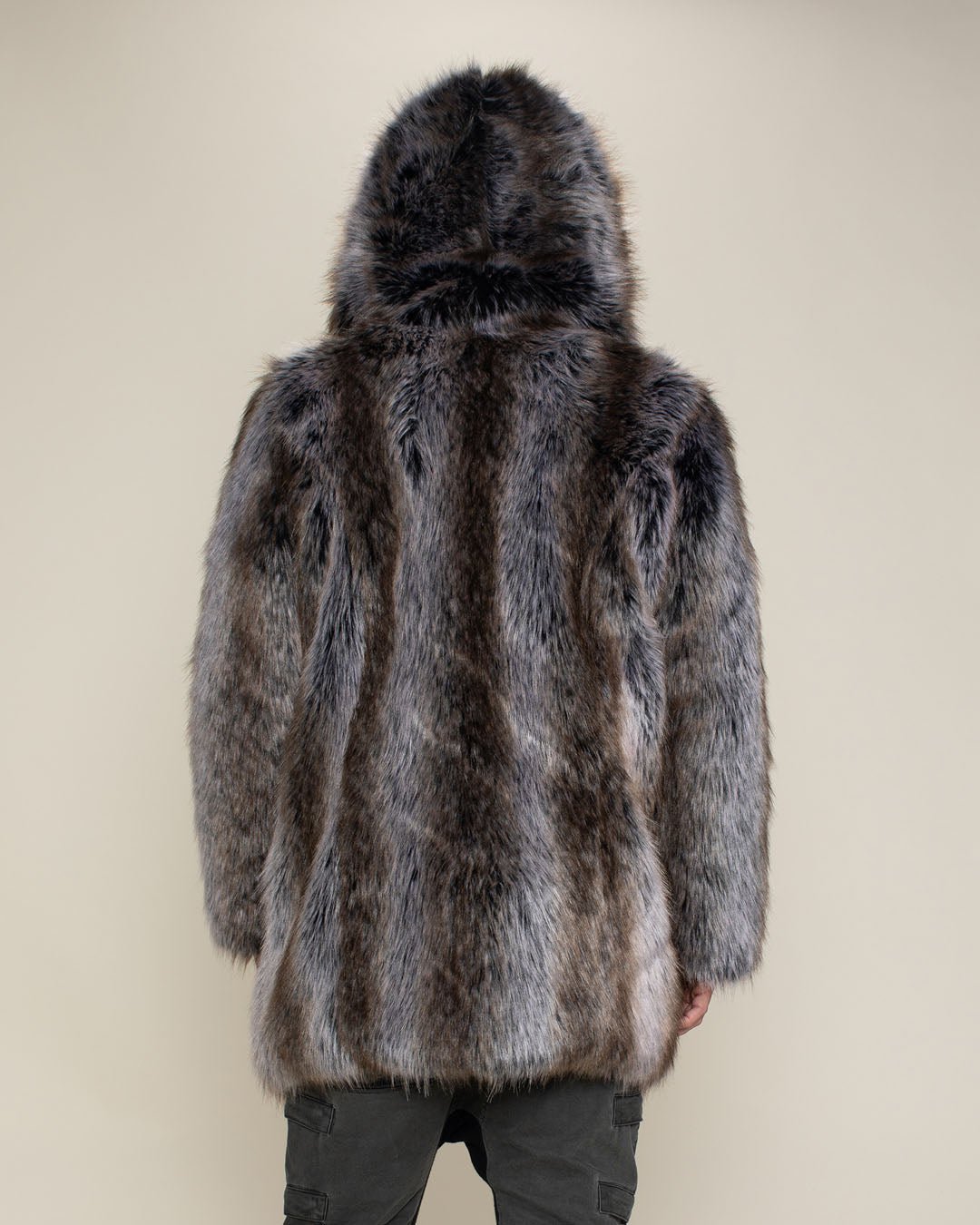 Man wearing Hooded Grey Wolf  Faux Fur Coat with the hood up and arms to his sides with this entire back facing the camera. 