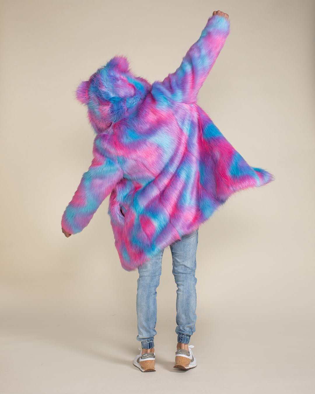 Male model with his back to the camera, doing airplane arms to showcase the Cotton Candy Bear faux fur coat.
Male model with his back to the camera, doing airplane arms to showcase the Cotton Candy Bear faux fur coat.

