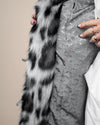 Close-up of inner logo lining and button loops on Collared Himalayan Snow Leopard Fake Fur Jacket. Stylish, detailed faux fur design.