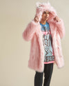 Guy gazes into the distance, slightly turned, holding the hood of the Flamingo Wolf Classic faux fur coat.