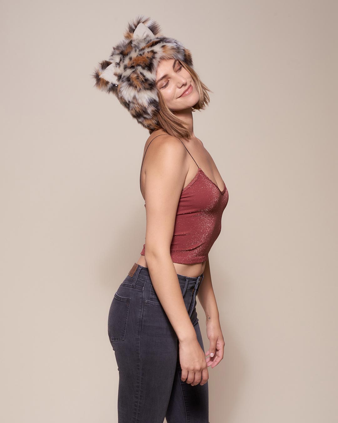 Woman wearing Mother Clouded Leopard Faux Fur Hood, side view