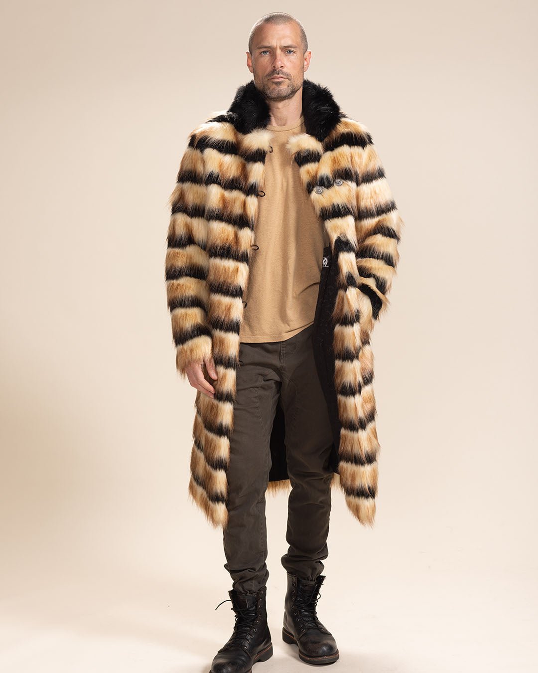 Handsome man with one hand in pocket of open Gazelle Collared Vegan Fur Coat. Stylish and confident.