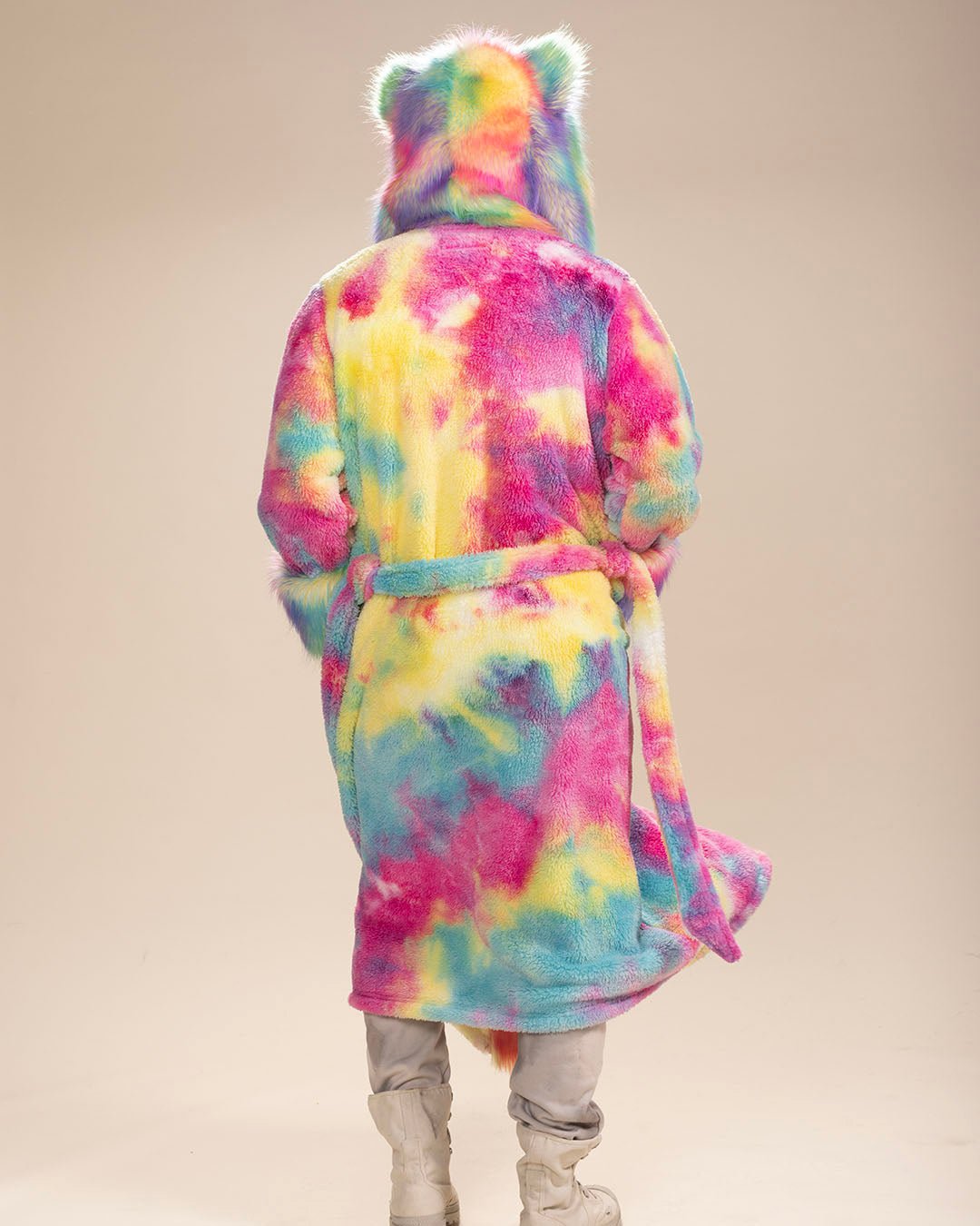 Man in Faux Fur Rainbow Bear Robe, belt open, hood and ears up, back fully to the camera—playful and cozy style.