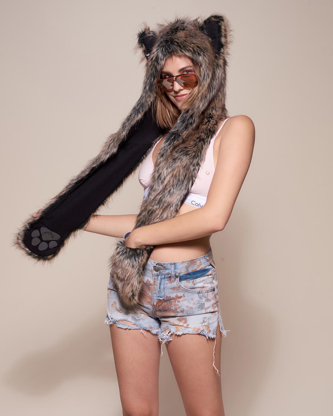 Woman wearing Dire Wolf Faux Fur Hood, front view