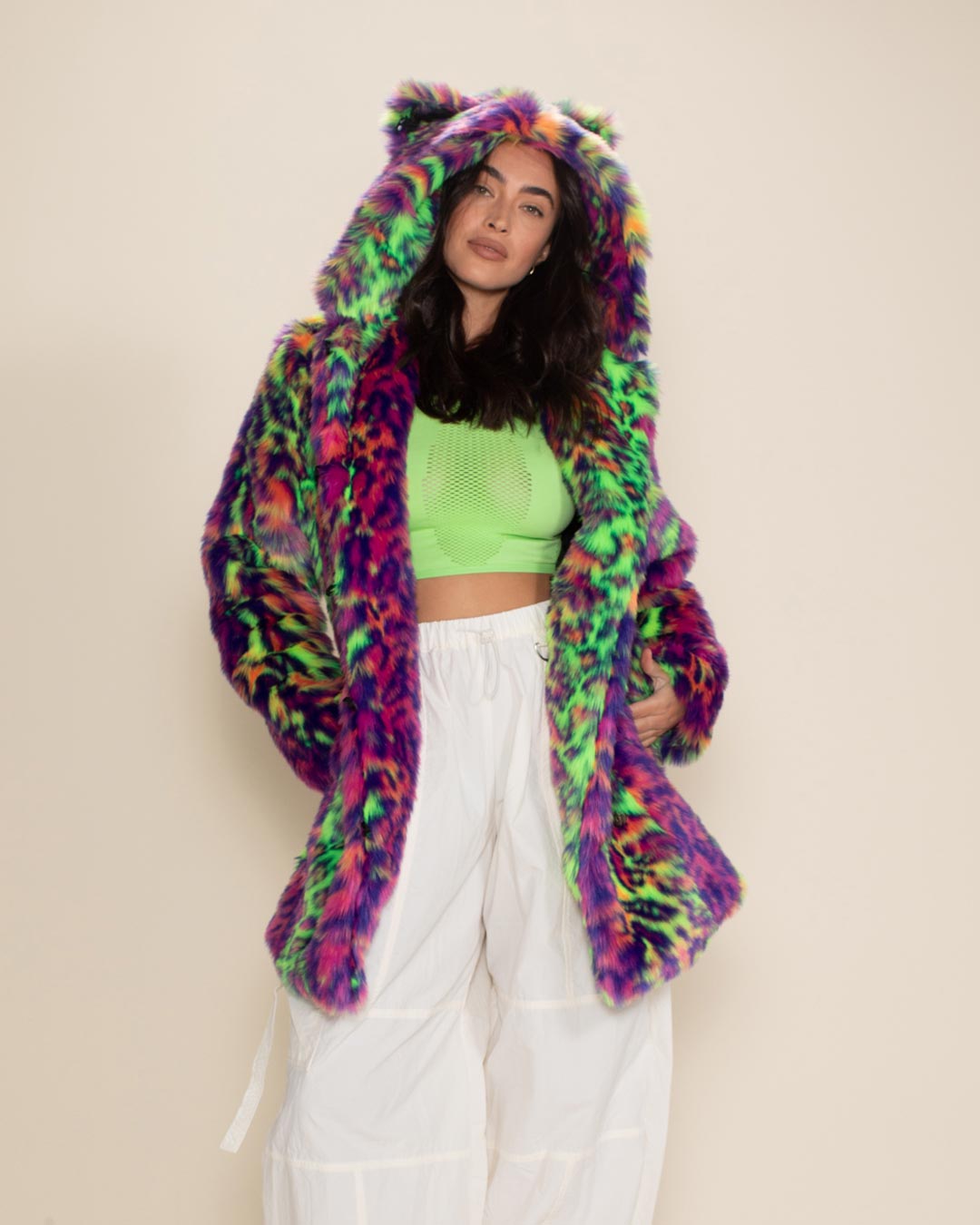 Cool, dark-haired model looks swanky in her Classic Neon Leopard Cat faux fur coat.