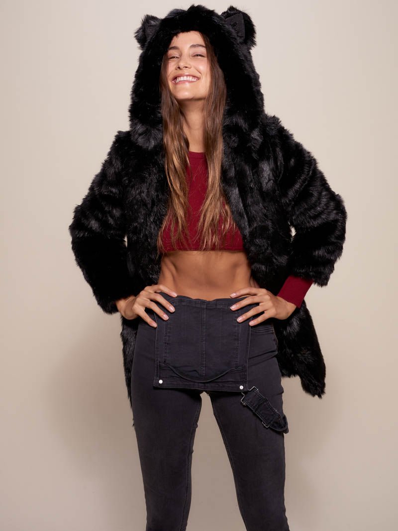 Girl Model with hands on her waist and smiling, wearing a Faux Fur Black Panther hooded coat with ears.