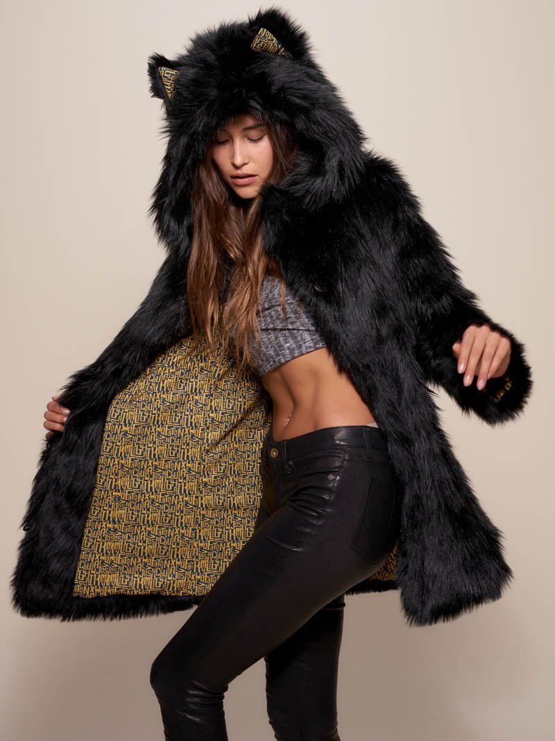 Woman wearing Collector Edition Black Wolf Faux Fur Coat, side view