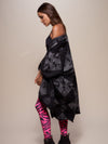 Woman wearing Night Fox Fabric Poncho, side view 2